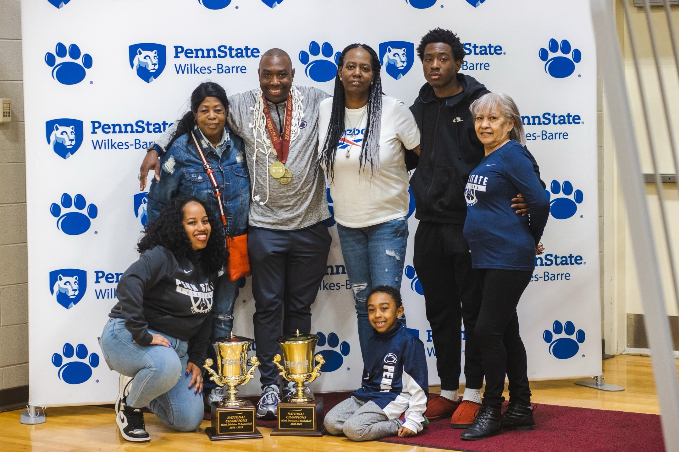 Coach Hammett celebrating championships with his family